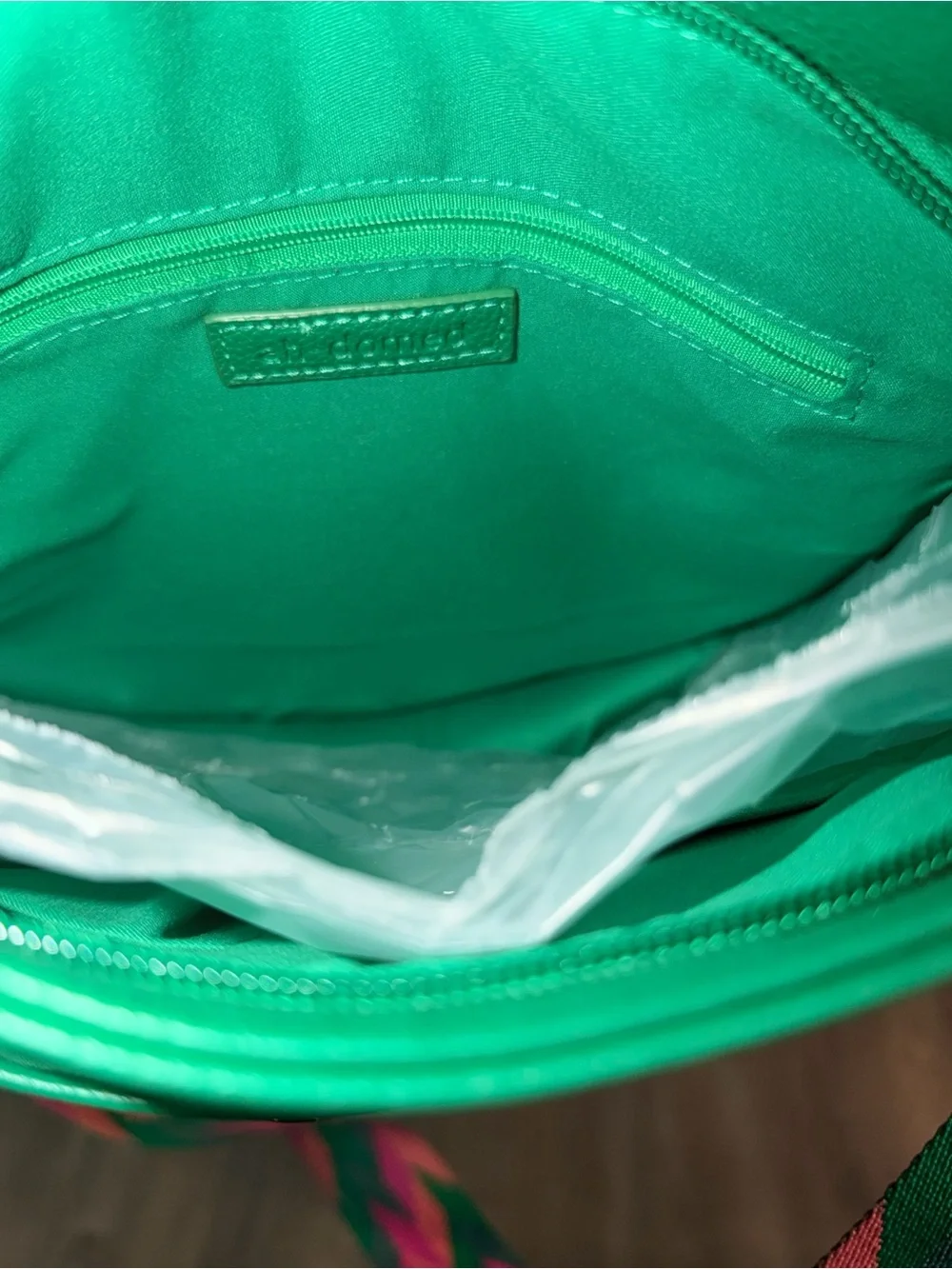 Vibrant Green Crossbody Bag with Multicolor Woven Strap